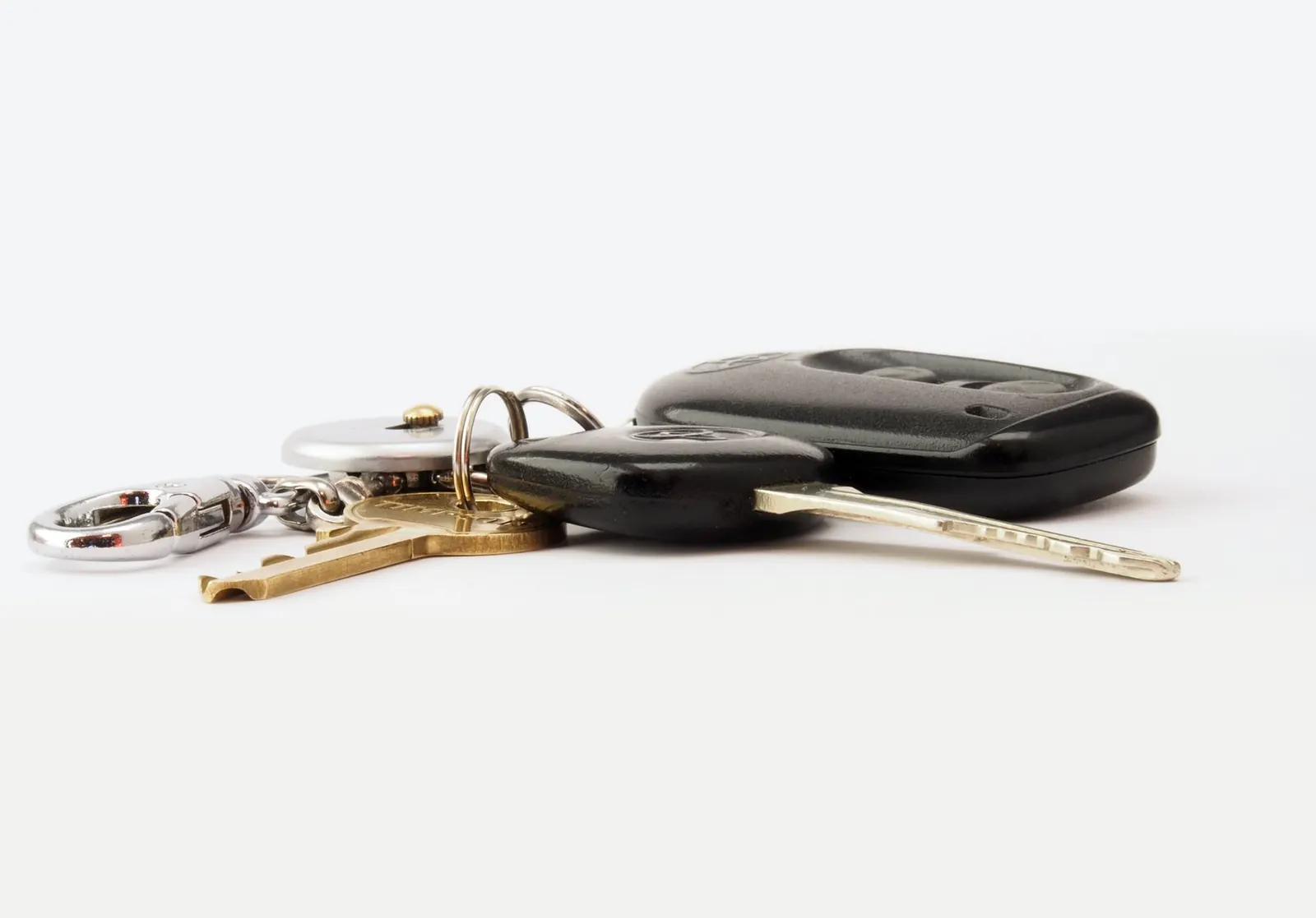 Car keys on a white table