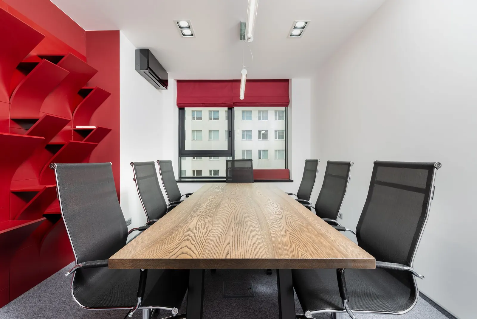 Empty meeting room with a long table
